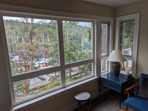 Large front window overlooks marina