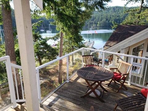 Patio deck overlooks marina - partial view of the bay